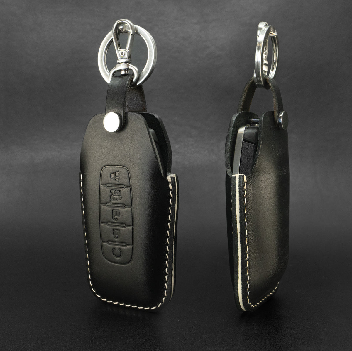 Infiniti key fob leather case, close-up of snap closure