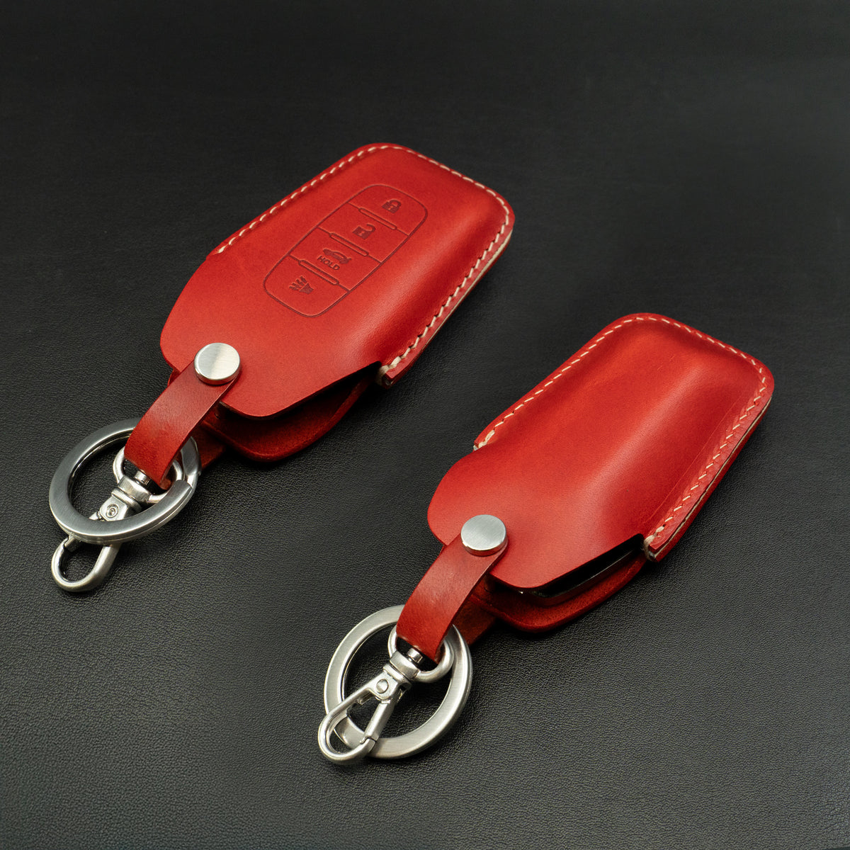 Infiniti key fob leather case shown in packaging