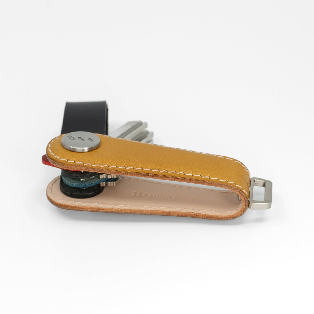 Yellow NOVONAPPA calfskin key organizer open with keys fanned out