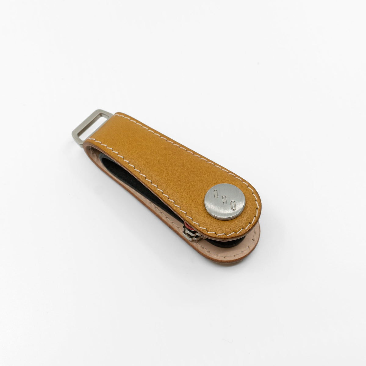Yellow NOVONAPPA calfskin key organizer holding keys, side view