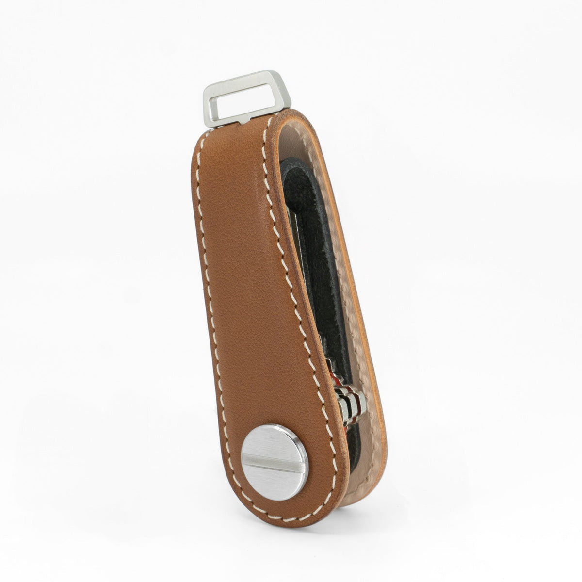 Brown NOVONAPPA calfskin key organizer holding keys, side view