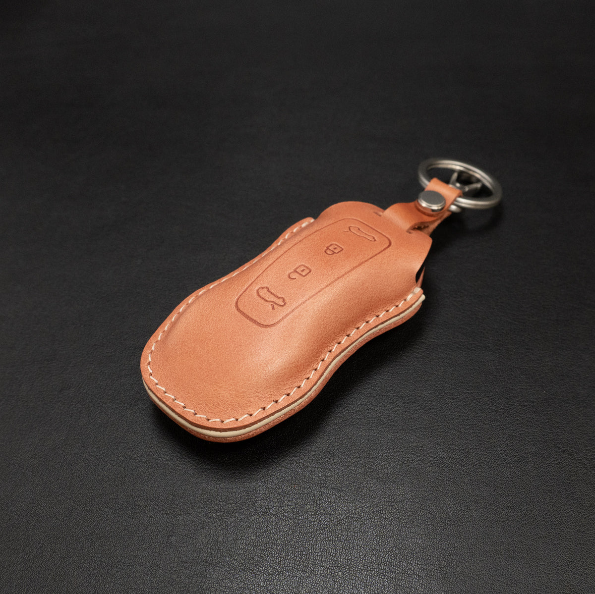Porsche Macan EV key fob leather cover, angled view