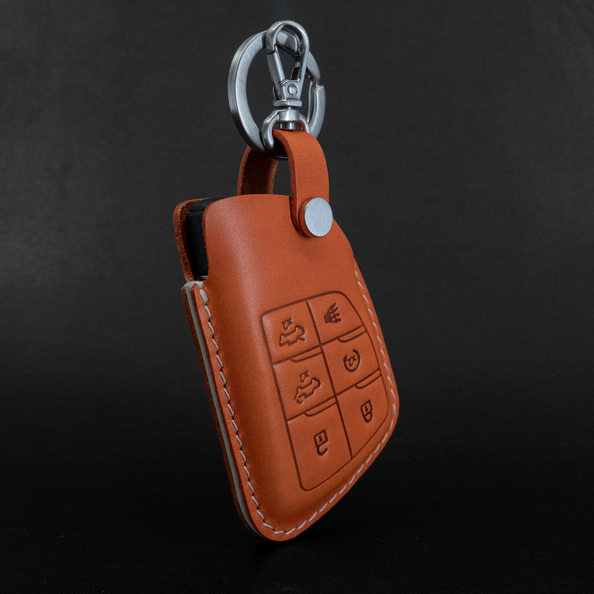 Chevy GMC key fob leather case, close-up of snap closure