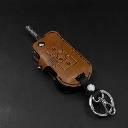 INEOS Grenadier leather key cover – brown body with black side accent detail