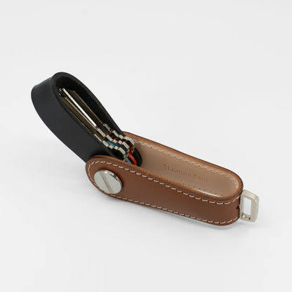 Brown Gaeta leather key organizer held in hand for size reference