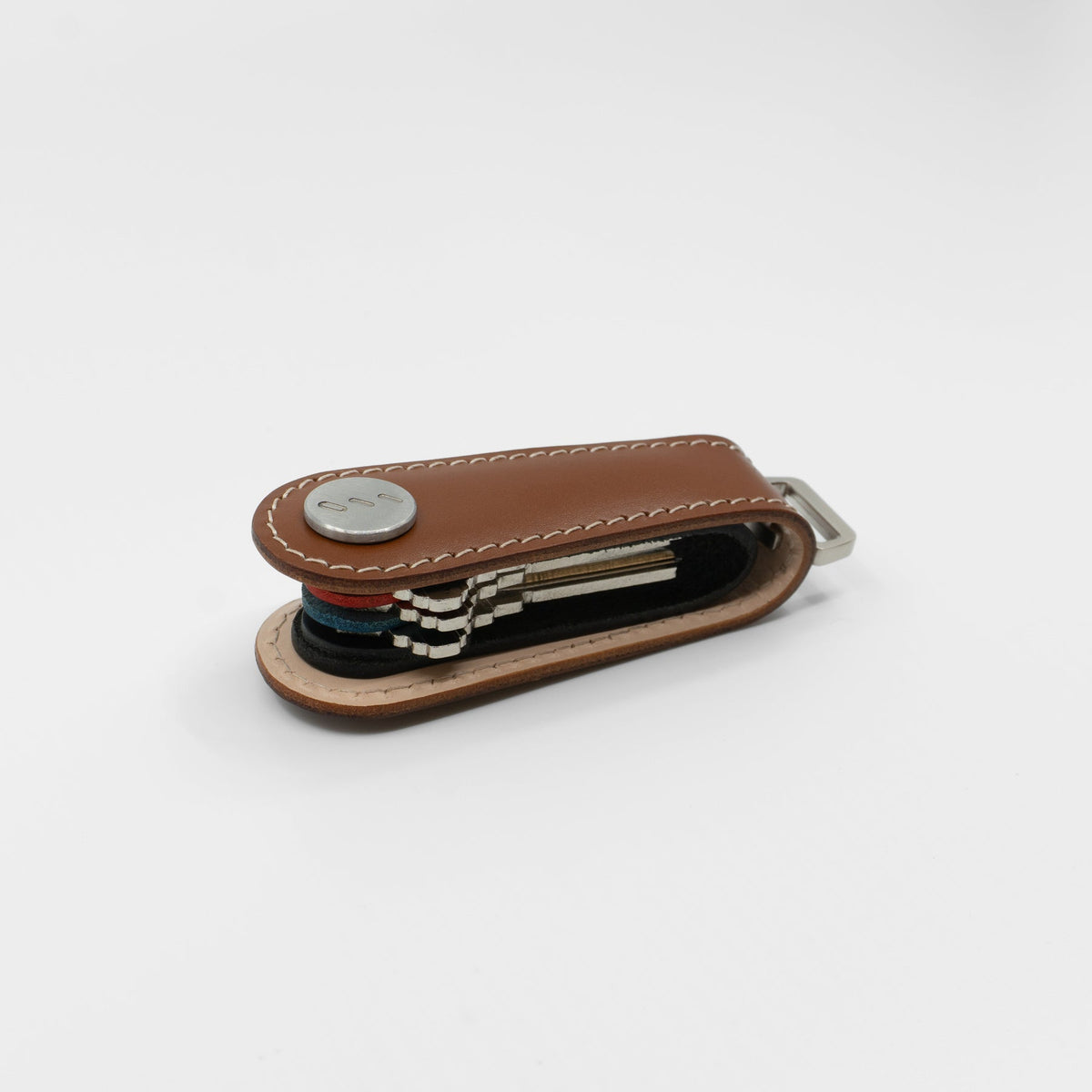 Brown Gaeta leather key organizer holding keys, side view