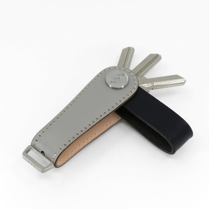Gray Gaeta leather key organizer held in hand for size reference
