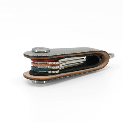 Gray Gaeta leather key organizer open with keys fanned out