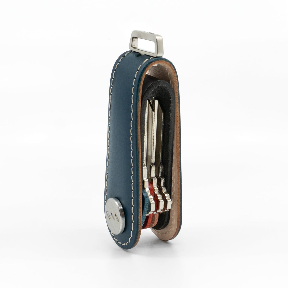 Navy Gaeta leather key organizer holding keys, side view