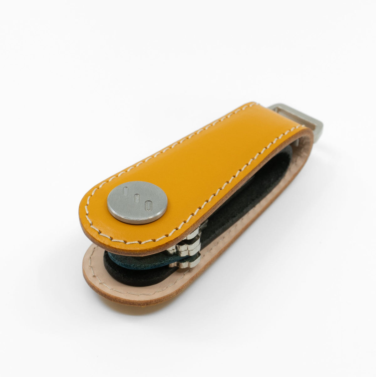 Yellow Gaeta leather key organizer open with keys fanned out