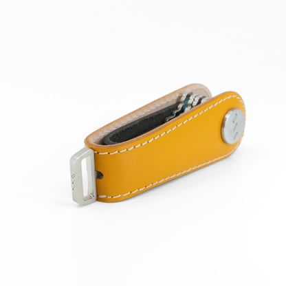 Close-up of stitching on yellow Gaeta leather key organizer