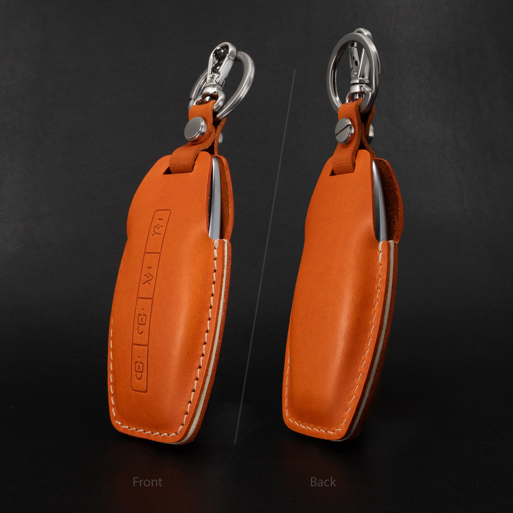 Lucid Gravity leather key fob cover in orange color